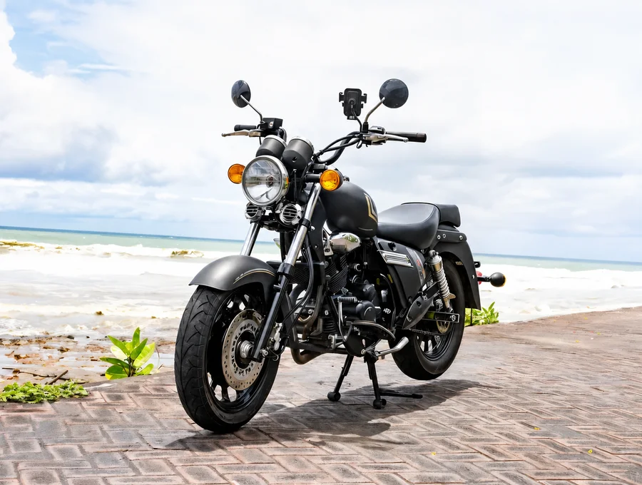Black-and-chrome Benelli Motobi 200 Evo cruiser with round headlamp, low bench seat, long exhausts and side bags