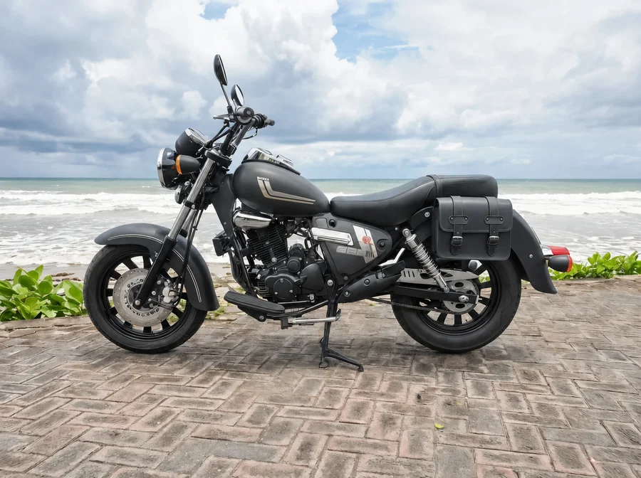 Black-and-chrome Benelli Motobi 200 Evo cruiser with round headlamp, low bench seat, long exhausts and side bags