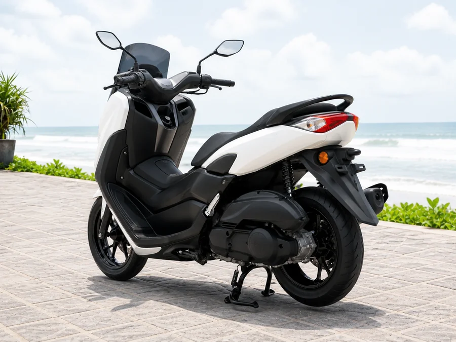 First-generation Yamaha NMAX155 road scooter with windscreen, broad body and wide two-level seat