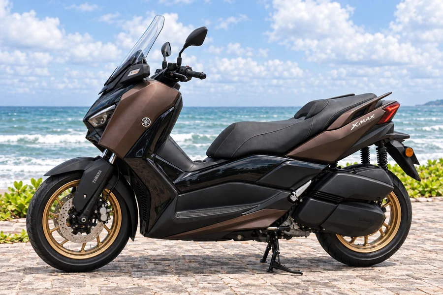 Bronze Yamaha XMAX 250 TECH MAX with gold wheels, front three-quarter view