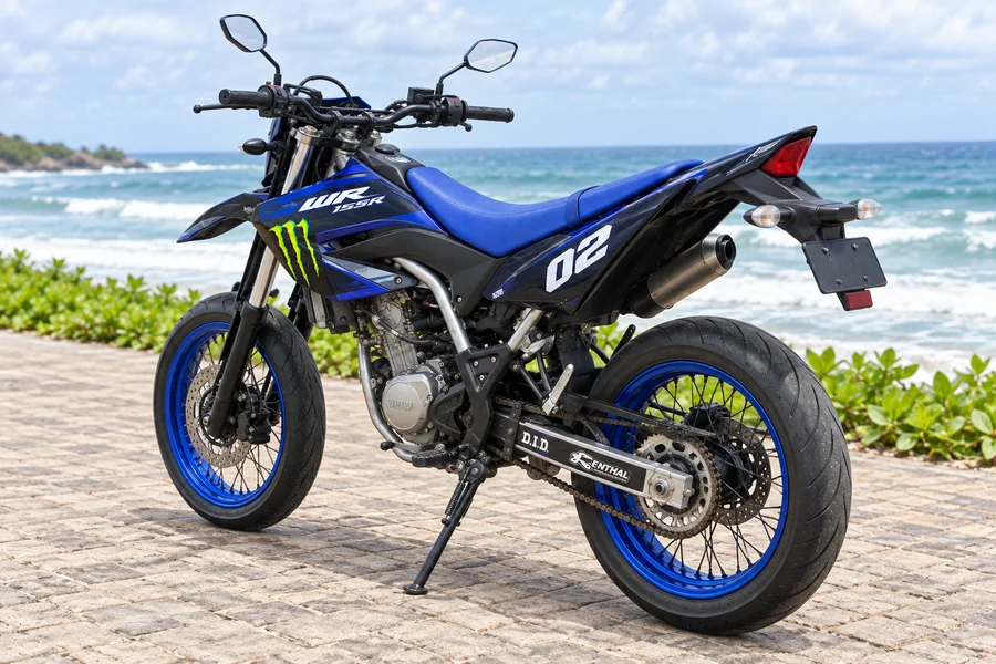 Blue Yamaha WR155R with supermoto road wheels, front three-quarter view